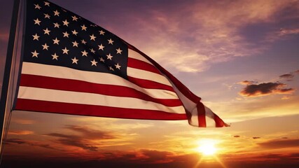 Sunset view of the American flag waving in the wind against a colorful sky