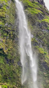 Poco do Bacalhau waterfall cascading over rocks