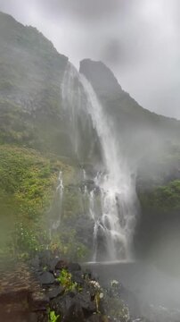 Poco do Bacalhau waterfall cascading after rain