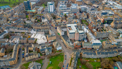 Showing dense stone architecture of central Edinburgh streets