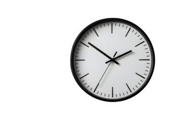 Round wall clock showing time with simple black and white design on white background in indoor setting