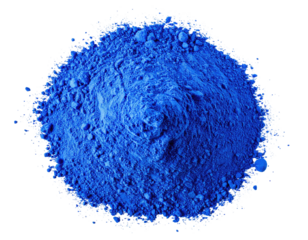 Heap of vivid, textured, powdery, intense blue pigment