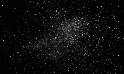 Fototapeta premium Sparkling dust or stars scattered across dark void