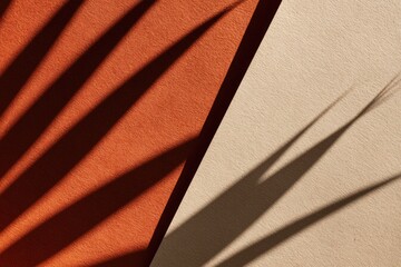 Abstract composition with strong shadows on textured paper, divided in two colors
