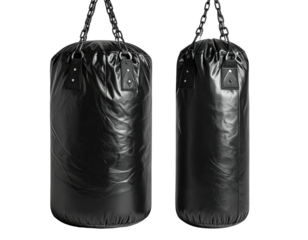 Two black punching bags hanging against a dark backdrop