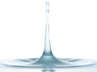 A single droplet of water falls into a pool of calm water, creating ripples and waves