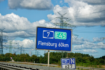 Fototapeta premium Autobahn sign to Flensburg 60km on northern route A7 E45