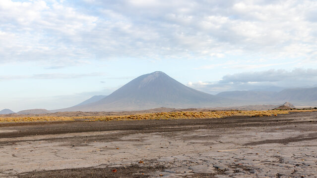 Ol Doinyo Lengai volcano under a cloudy sky