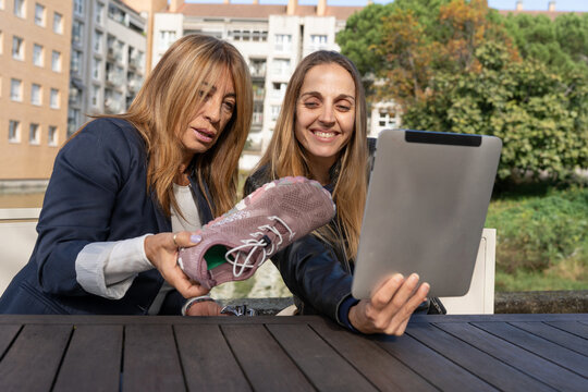 Content creators showcasing shoes for social media