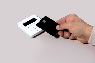 Contactless payment concept with black credit card