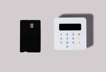 Payment card and terminal on minimalist background