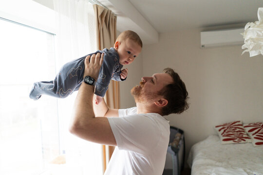 Loving father enjoying precious moments with his baby