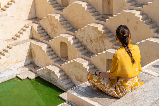 Woman in traditional attire at Indian stepwell