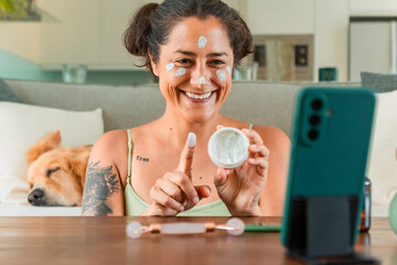 Content creator filming a skincare tutorial at home