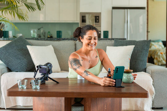 Content creator filming self-care video at home