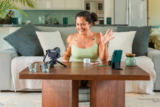 Skincare video tutorial in a cozy home setting