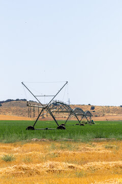 Center pivot irrigation system in agricultural field