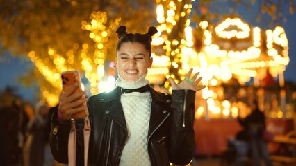 Energetic young lady capturing cheerful moments at festival
