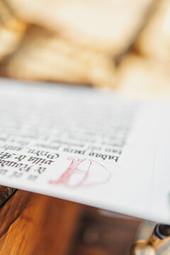 Elegant gothic writing on historical parchment