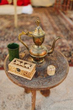 Vintage medieval table with antique objects