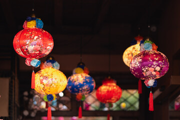 Colorful festive lanterns with floral decorations