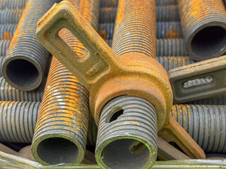 Rusted threaded construction props in close-up view