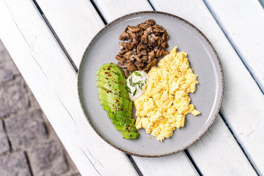 Delicious keto breakfast with avocado and mushrooms