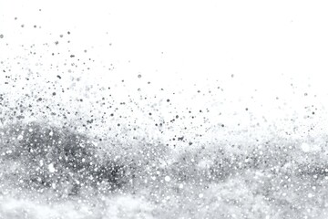 Obraz premium Scattered grey droplets, sparse against stark white space