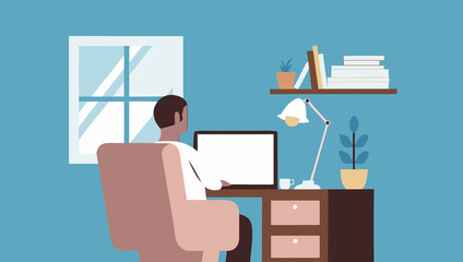 Professional man working at a desk in a modern home office space