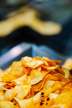Paprika-flavored chips on production line in factory