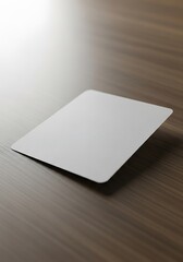 Minimalist Presentation Mockup of a Card on a Dark Wood Grain Surface