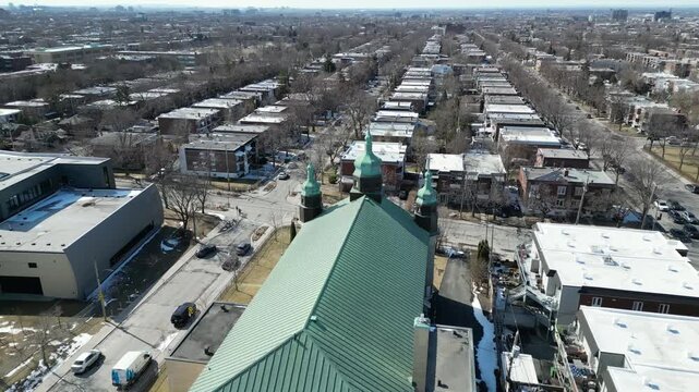 Aerial view of Assumption of the Blessed Virgin Mary Catholic Church in Montreal on a clear winter day. g.