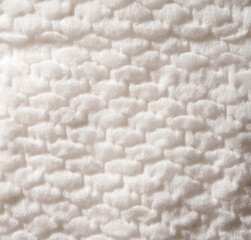 Macro Texture of Soft White Quilted Cotton Fabric