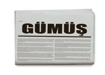 Overhead View of Newspaper Gumus Headline