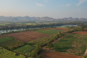 Obraz premium A top down view from a drone of a agricultural field in Thailand ready for new growing season