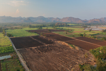 A top down view from a drone  of a agricultural field in Thailand ready for new growing season