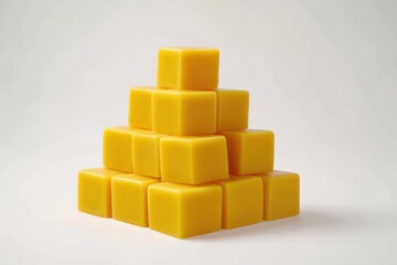 Stacked Yellow Cubes Arranged In Pyramid Form On Plain White Backdrop