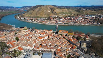 Aerial panoramic view around the old town of the city Tournon-sur-Rhonein France on a sunny day in early spring.