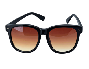 Fashionable, classic, black-framed sunglasses with brown gradient lenses, isolated on black