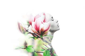 Double exposure made with young nude beautiful woman with healthy skin and spring magnolia flowers, isolated. © Anna Efetova