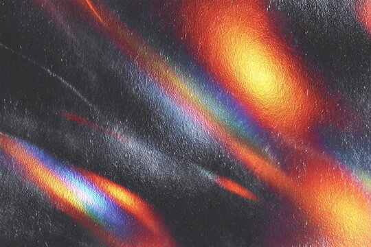 Colorful abstract patterns with glowing orange and purple elements on a dark background.