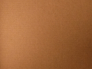 The image provided appears to be a&nbsp;brown, textured material, most likely&nbsp;kraft paper&nbsp;or&nbsp;cardboard&nbsp;paperboard
