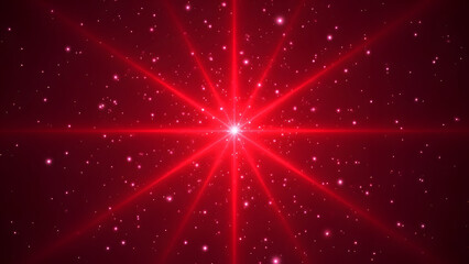 A bright red starburst emanates light across a dark background filled with tiny shimmering particles and glowing specks creating a cosmic or festive effect