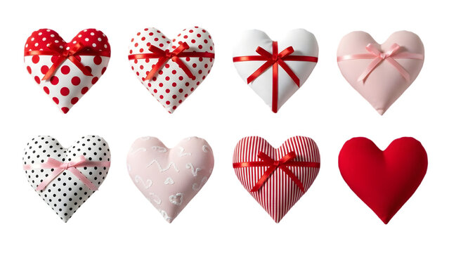 A collection of decorative fabric hearts in various patterns and colors including red and white polka dots pink stripes and solid red