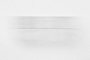 ぼやけた木のブロックと、白い紙