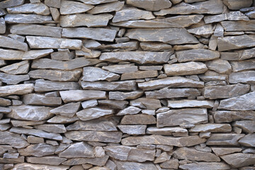 Grey stone slap fence wall natural background
