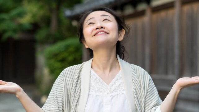 Smiling woman adult female kimono style traditional robe outdoors alleyway smiling woman shrugging palms up thoughtful soft natural light smiling