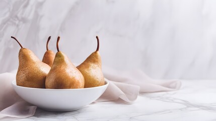 Still Life of Ripe Pears in a White Bowl on a Marble Surface.