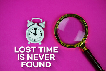 Alarm clock and a magnifying glass on a bright pink background, with text 