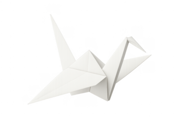 White origami paper crane flying symbolizing peace